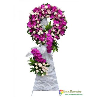 Order purple condolence flower arrangement in Hanoi