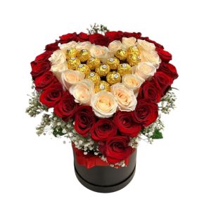 Heart shaped box with roses and chocolate