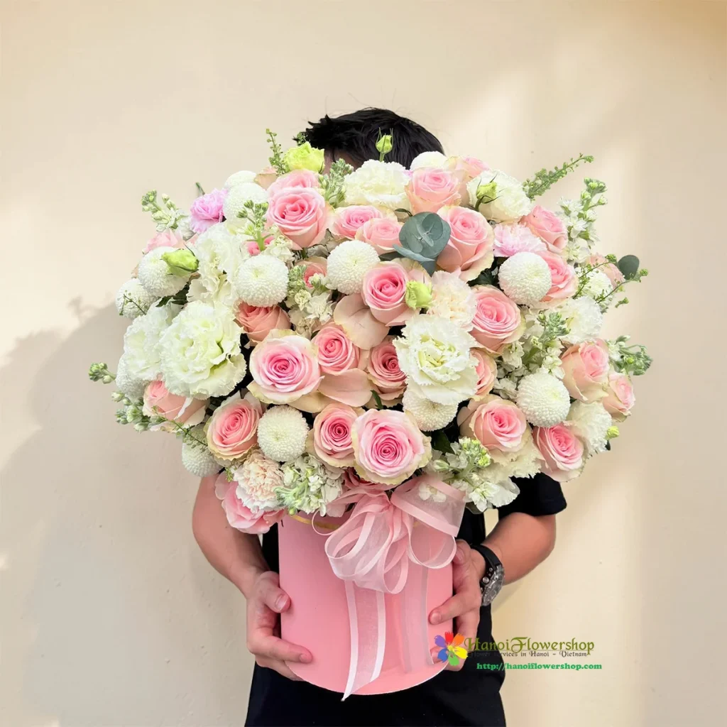Pastel Flower Basket with roses, dephiniums, lisianthus from a Florist Shop in Long Bien Hanoi